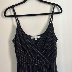 Multi color stripe romper jumpsuit never worn